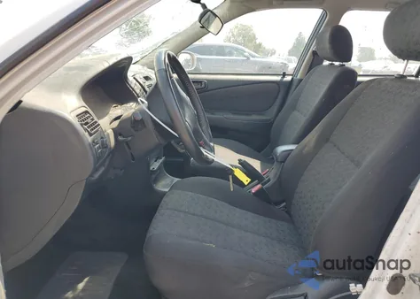 2002 Toyota Corolla Ce из США, поврежденный, VIN 1NXBR12EX2Z651995